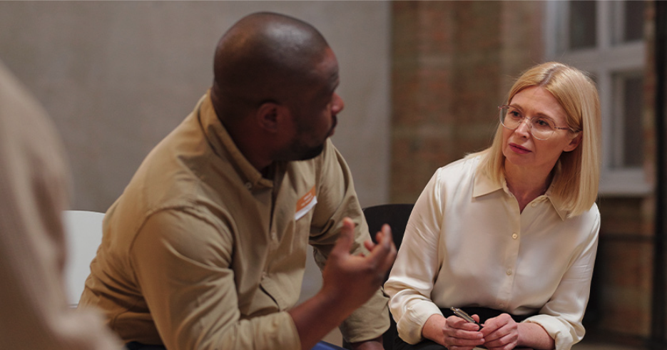 Man and Woman Having a Conversation